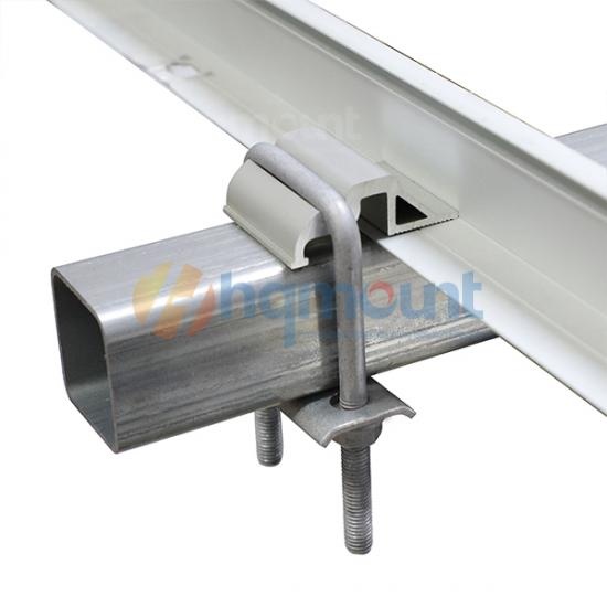 Solar mounting clamp installed on square tube ground mount structure